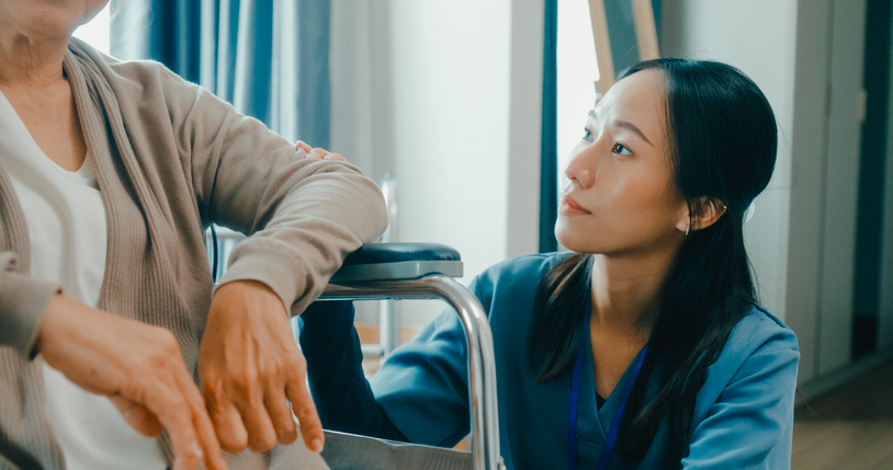 Health professional comforts a patient